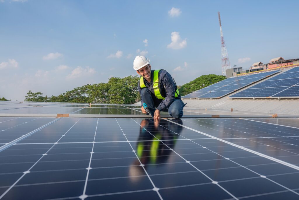 Engineer service check installation solar cell on the roof.